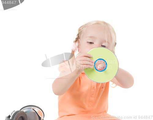 Image of Shot of little girl with CD in studio