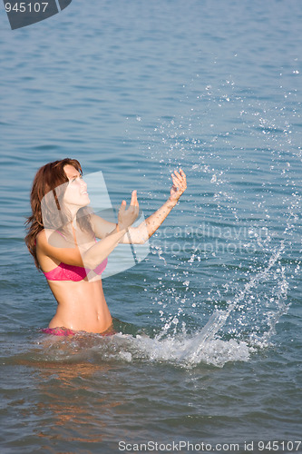 Image of Young girl in the sea