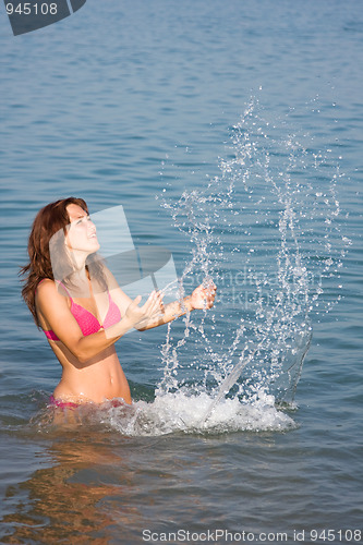 Image of Young girl in the sea
