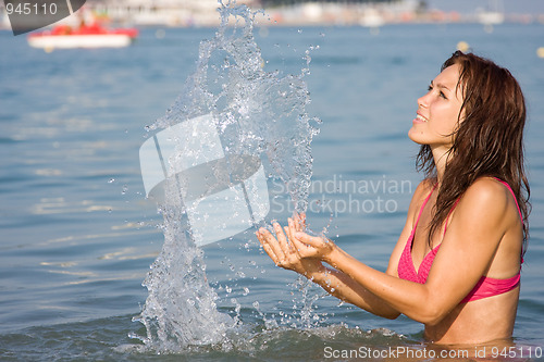 Image of Young girl in the sea