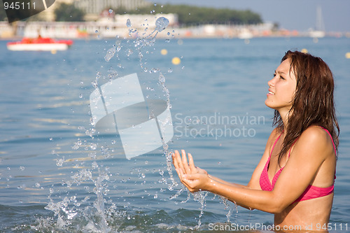 Image of Young girl in the sea