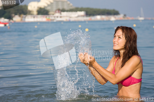 Image of Young girl in the sea