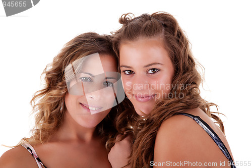 Image of Happy mother and daughter embraced