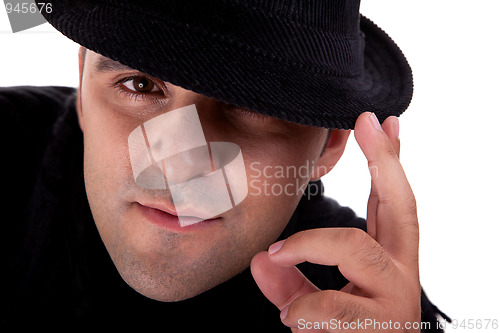 Image of Portrait of a man with his black hat