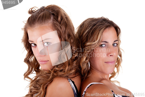 Image of Beautiful daughter and mother, back to back