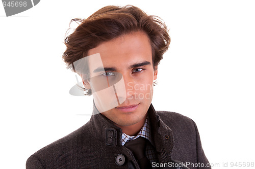 Image of Portrait of a young businessman, in autumn/winter clothes