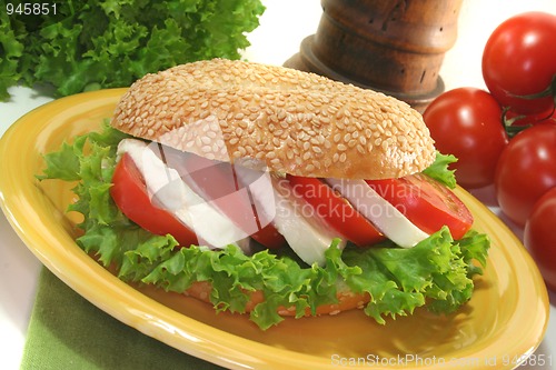 Image of Bagel with tomato and mozzarella