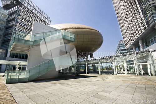 Image of Bright outlook for business. Modern office block with sunny beau