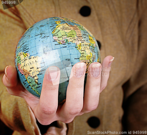 Image of Globe in a girl's hands