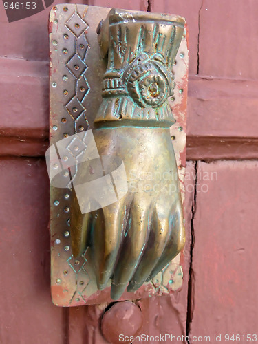 Image of Knocker at the door.