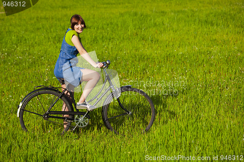 Image of Girl with a bicycle