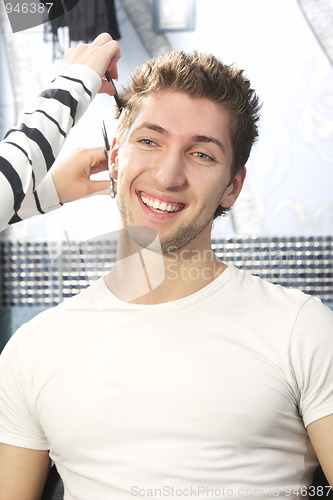 Image of Smiling guy have haircut