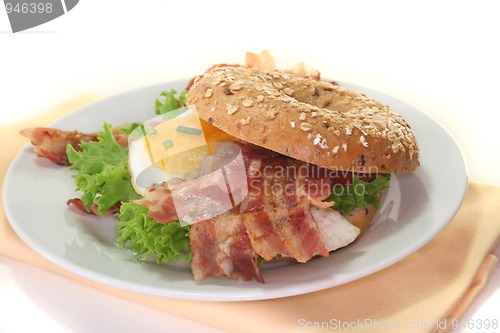 Image of Bagel with fried egg and bacon