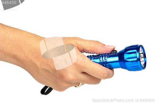 Image of Blue metal LED flashlight in hand