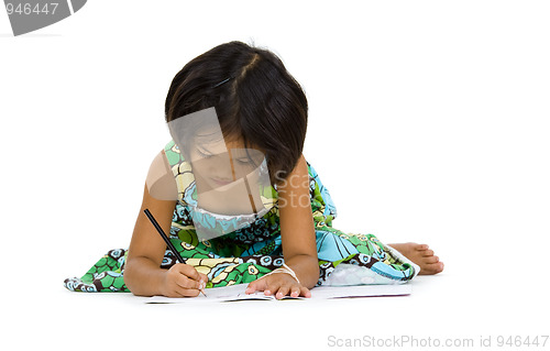 Image of cute girl writing