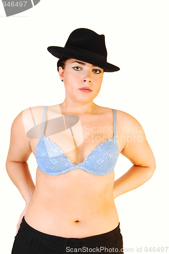 Image of Woman in bra and hat.