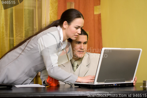 Image of Couple working