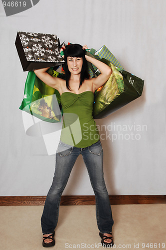 Image of Girl back from shopping.