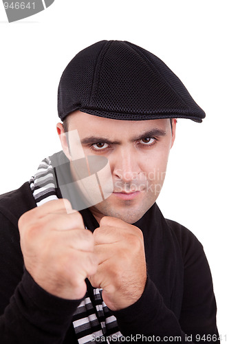 Image of Angry man punching fist 