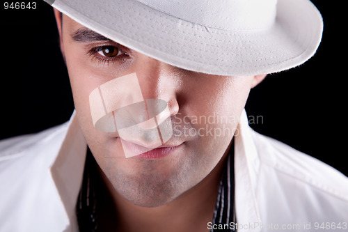 Image of Portrait of a man with his white hat