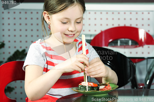 Image of Girl with sticks