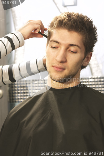 Image of Man at barbers shop