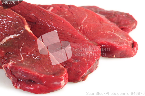 Image of Four rump steaks, close-up