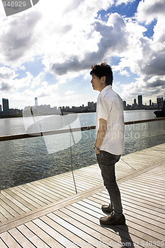 Image of asia man relax in the park 