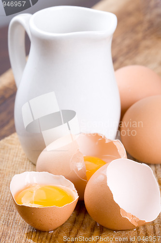 Image of brown eggs and some milk