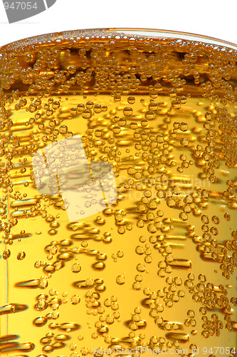 Image of bubbles in glass with beer