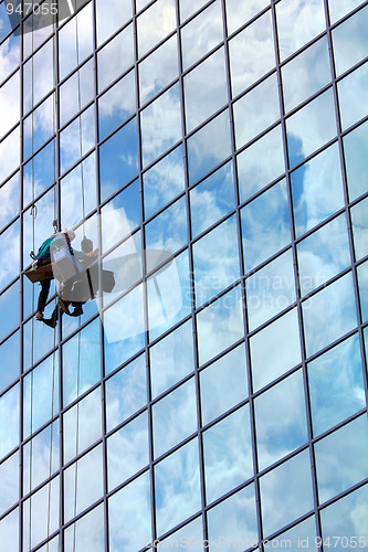 Image of window cleaner at work