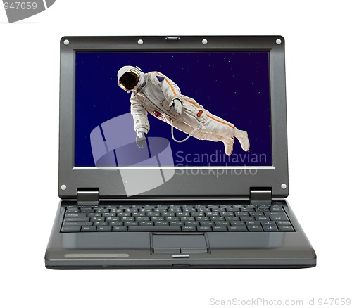 Image of small laptop with astronaut in space