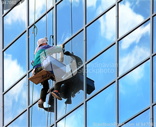 Image of window cleaner at work