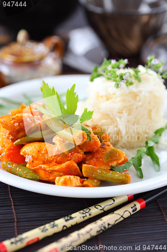 Image of Red chicken curry stripes with rice