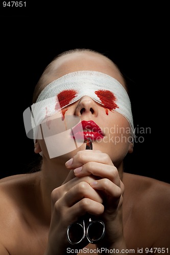 Image of Blind painful woman