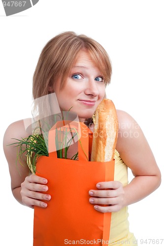 Image of Surprised woman with baguette