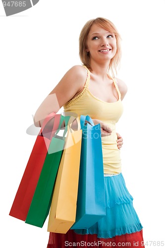 Image of Smiling girl with colorful bags