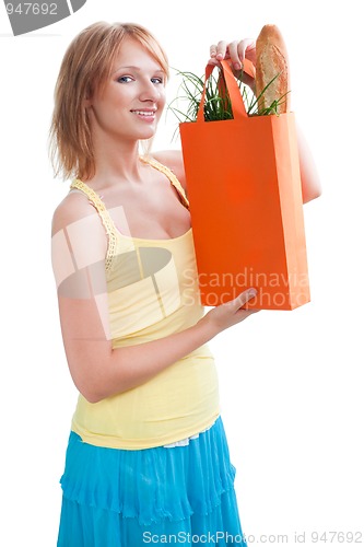 Image of Happy woman with shopping bag