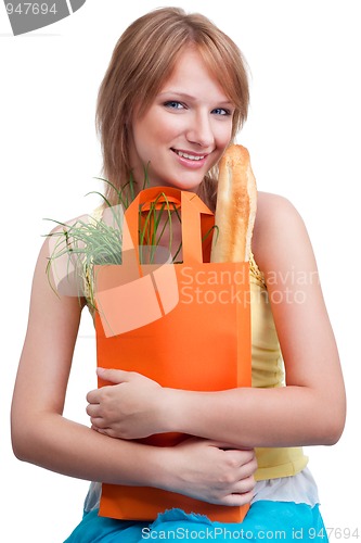 Image of Happy woman holding shopping bag