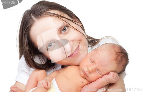 Image of Mother smile holding her baby