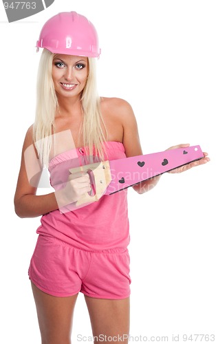 Image of Blond woman with pink saw