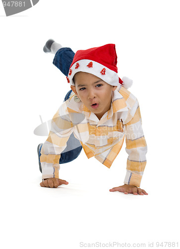 Image of boy with santa claus hat