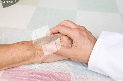 Image of doctor and elderly patient