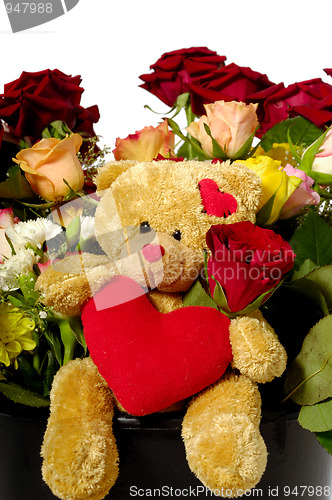 Image of Teddy bear and roses