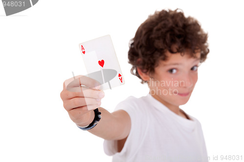 Image of cute boy showing an ace of hearts