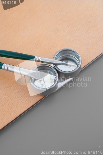 Image of Painter pallete detail with brushes