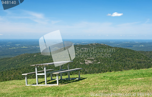 Image of Picnic table in mountains