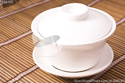 Image of teacup on wooden table 