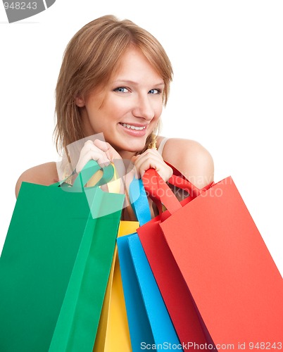 Image of Happy woman shopping with bags smile