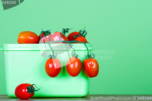 Image of container with fresh tomatoes